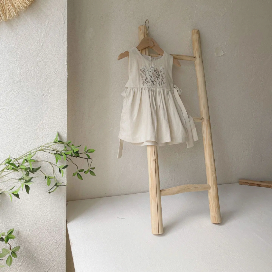 flower dress hanging on ladder