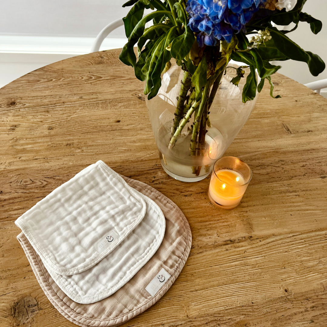 white and beige burping cloth