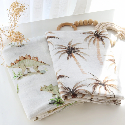 dinosaurs and palm tree blanket