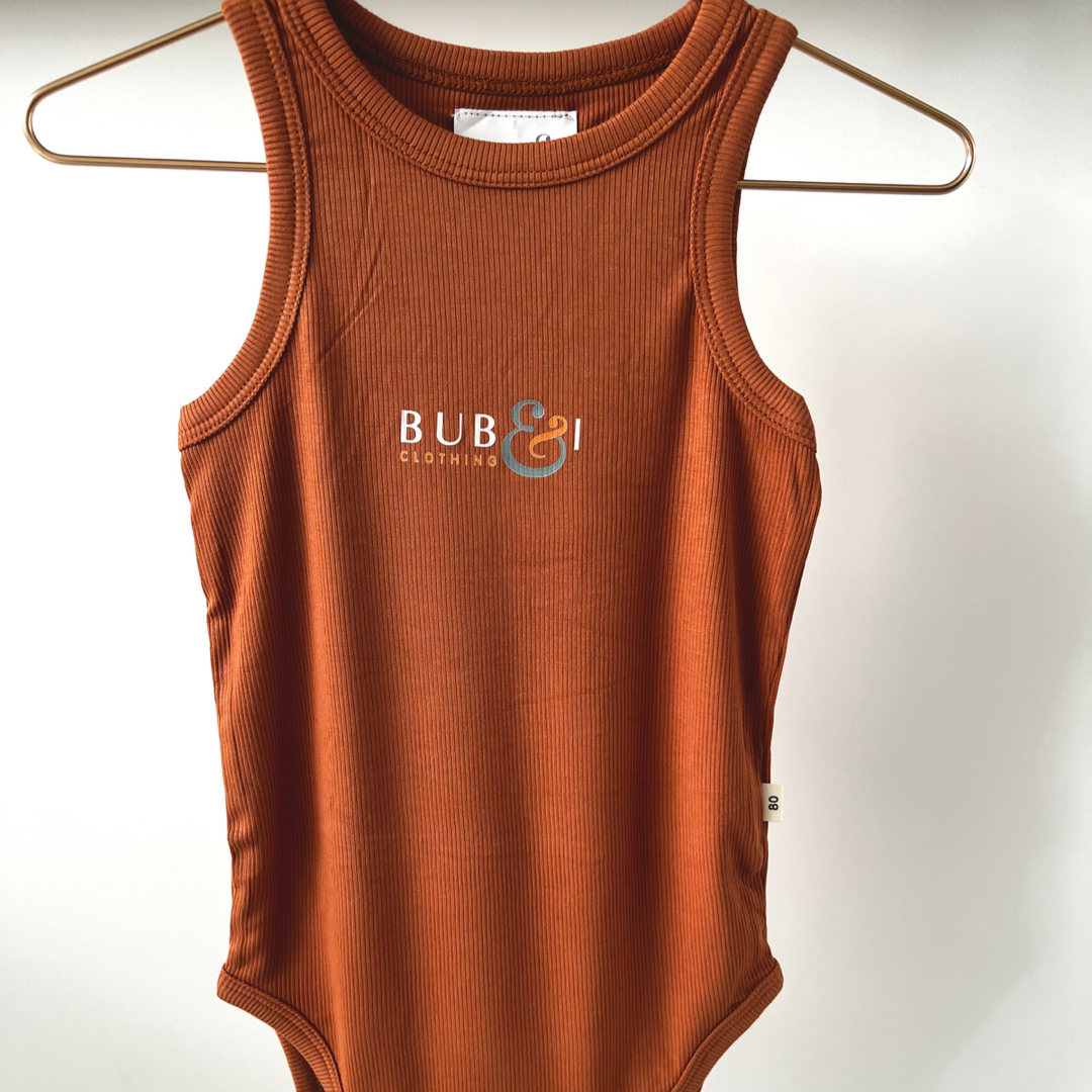 baby Body suit burnt orange 