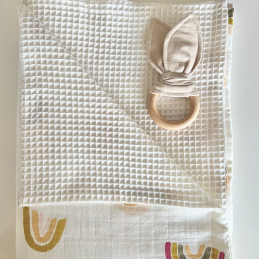 white blankets with rainbows